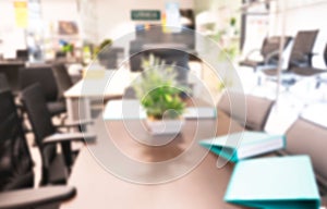 AbstractÃÂ blurred of modern office work space of table work in office . ideal for presentation background photo